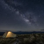 What causes wind to blow? A campsite under the Milky Way on a windy mountain night.